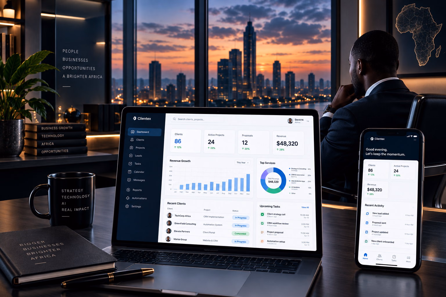 A CRM workspace on a laptop and phone with an executive looking over a city at dusk